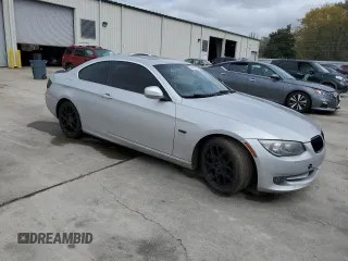 2011 BMW 3 Series 328i xDrive with VIN WBAKF5C5XBE586494, listed as a Copart auction lot 49692595 with 239,048 mi miles and Salvage title. Bid and sale history available at DreamBid. Image 4.