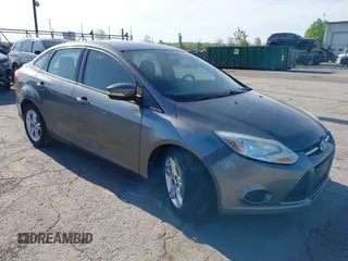 2013 Ford Focus SE z VIN 1FADP3F23DL321046, wystawiony jako IAAI lot #42249279 z przebiegiem 98 479 mil mil oraz . Historia ofert i sprzedaży dostępna na DreamBid. Obrazek 1.