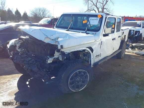 2022 Jeep Gladiator Overland with VIN 1C6HJTFGXNL142438, listed as a IAAI auction lot 41442944 with 52,867 mi miles. Bid and sale history available at carsss.com. Image 2.