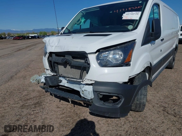 2023 Ford Transit Cargo with VIN 1FTYE1Y82PKA84762, listed as a IAAI auction lot 41718720 with 21,029 mi miles and . Bid and sale history available at DreamBid. Image 6.