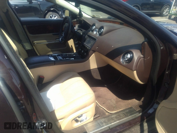2011 Jaguar XJ with VIN SAJWA1CB5BLV09952, listed as a IAAI auction lot 41435624 with 114,892 mi miles and . Bid and sale history available at DreamBid. Image 5.