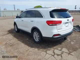 2016 Kia Sorento LX with VIN 5XYPG4A51GG023545, listed as a IAAI auction lot 41923123 with 168,438 mi miles. Bid and sale history available at carsss.com. Image 2.