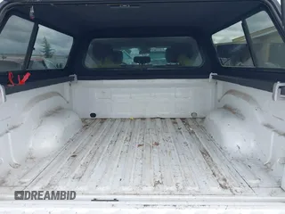 2014 Ram 1500 Tradesman with VIN 1C6RR7KG4ES323888, listed as a IAAI auction lot 41975474 with 93,779 mi miles and . Bid and sale history available at DreamBid. Image 18.