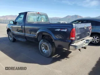 1999 Ford F-250 with VIN 1FTNF21S1XED16309, listed as a Copart auction lot 77267764 with 216,158 mi miles and Clean title. Bid and sale history available at DreamBid. Image 2.