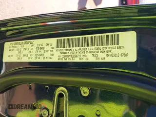 2014 Ram 1500 Sport z VIN 1C6RR6MT3ES366719, wystawiony jako IAAI lot #42228139 z przebiegiem Nie podano mil oraz . Historia ofert i sprzedaży dostępna na DreamBid. Obrazek 9.