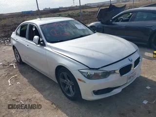 2014 BMW 3 Series 328i with VIN WBA3C1C59EK108868, listed as a IAAI auction lot 41108653 with Not Provided miles and . Bid and sale history available at carsss.com. Image 1.