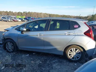 2016 Honda Fit LX with VIN JHMGK5H58GX003864, listed as a IAAI auction lot 41554364 with 258,819 mi miles. Bid and sale history available at carsss.com. Image 14.