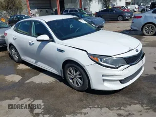 2016 Kia Optima LX with VIN 5XXGT4L3XGG054286, listed as a IAAI auction lot 41924937 with 146,555 mi miles. Bid and sale history available at carsss.com. Image 1.