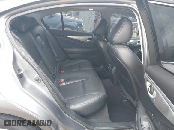 2015 Infiniti Q50 Premium with VIN JN1BV7AP7FM338434, listed as a IAAI auction lot 42158445 with 115,685 mi miles and . Bid and sale history available at DreamBid. Image 8.