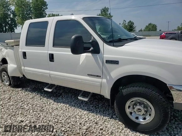 2002 Ford Super Duty F-250 XL with VIN 1FTNW21F72ED29593, listed as a Copart auction lot 68245844 with 301,129 mi miles and Salvage Title. Bid and sale history available at carsss.com. Image 10.