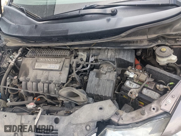 2012 Honda Insight LX with VIN JHMZE2H50CS004626, listed as a Copart auction lot 65198795 with 153,085 mi miles and Clean title. Bid and sale history available at DreamBid. Image 7.