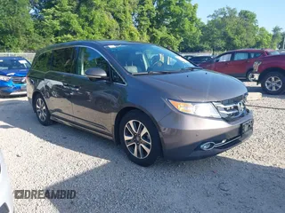 2016 Honda Odyssey Touring Elite z VIN 5FNRL5H92GB169673, wystawiony jako IAAI lot #42545951 z przebiegiem 77 478 mil mil oraz . Historia ofert i sprzedaży dostępna na DreamBid. Obrazek 1.