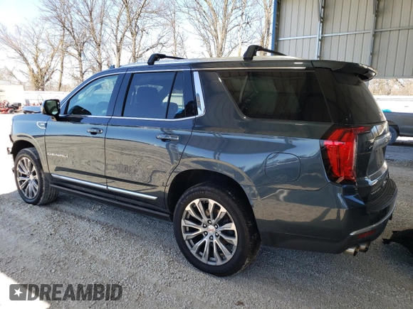 2021 GMC Yukon Denali with VIN 1GKS2DKLXMR387681, listed as a Copart auction lot 46830485 with 77,628 mi miles and Salvage Title. Bid and sale history available at carsss.com. Image 2.