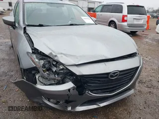 2016 Mazda 3 i Grand Touring z VIN 3MZBM1X74GM245295, wystawiony jako IAAI lot #41079843 z przebiegiem 183 480 mil mil oraz . Historia ofert i sprzedaży dostępna na DreamBid. Obrazek 6.