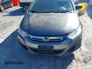 2012 Honda Insight LX with VIN JHMZE2H56CS004226, listed as a IAAI auction lot 41705401 with 131,761 mi miles and . Bid and sale history available at DreamBid. Image 6.