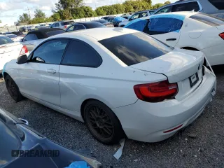 2015 BMW 2 Series 228i with VIN WBA1F5C52FV256575, listed as a Copart auction lot 88515575 with 127,012 mi miles and Salvage Title. Bid and sale history available at carsss.com. Image 2.