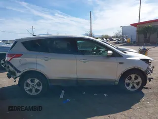 2014 Ford Escape SE z VIN 1FMCU0GX3EUB64164, wystawiony jako IAAI lot #41619535 z przebiegiem 100 767 mil mil oraz . Historia ofert i sprzedaży dostępna na DreamBid. Obrazek 14.