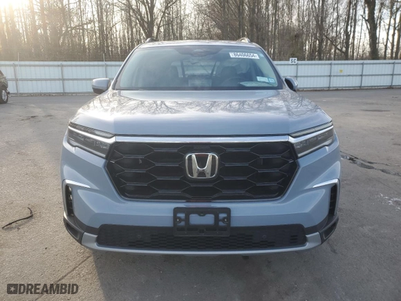 2024 Honda Pilot Touring with VIN 5FNYG1H70RB037781, listed as a Copart auction lot 86406654 with 11,080 mi miles and Salvage Title. Bid and sale history available at carsss.com. Image 5.