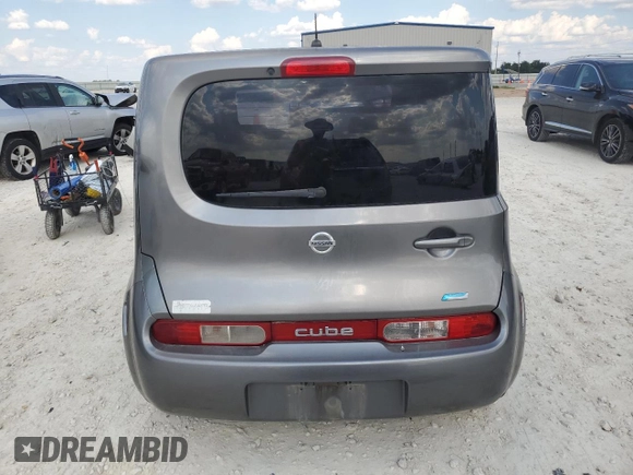 2014 Nissan Cube SL z VIN JN8AZ2KR7ET350527, wystawiony jako Copart lot #71530774 z przebiegiem Nie podano mil oraz Czysty tytuł • Clean title. Historia ofert i sprzedaży dostępna na DreamBid. Obrazek 6.