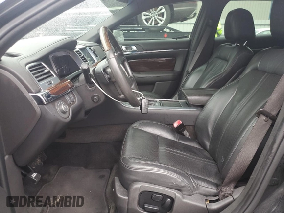2012 Lincoln MKS with VIN 1LNHL9ER3CG806878, listed as a Copart auction lot 87162644 with 136,878 mi miles and Salvage Title. Bid and sale history available at DreamBid. Image 7.