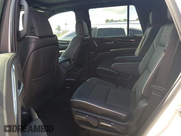 2021 Cadillac Escalade Sport z VIN 1GYS3EKL1MR270077, wystawiony jako Copart lot #74130854 z przebiegiem 21 584 mil mil oraz Szkoda całkowita • Salvage title. Historia ofert i sprzedaży dostępna na DreamBid. Obrazek 11.