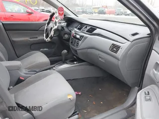 2006 Mitsubishi Lancer ES with VIN JA3AJ26E76U066867, listed as a IAAI auction lot 41904428 with 247,460 mi miles. Bid and sale history available at carsss.com. Image 5.