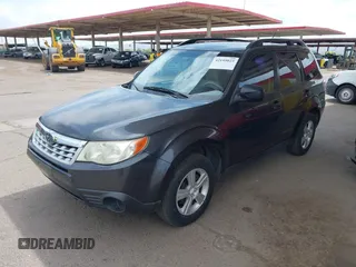 2012 Subaru Forester X with VIN JF2SHBBC2CH435307, listed as a IAAI auction lot 42195023 with 169,964 mi miles and . Bid and sale history available at DreamBid. Image 2.
