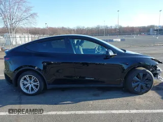 2023 Tesla Model Y Long Range with VIN 7SAYGAEE3PF925928, listed as a IAAI auction lot 41753910 with Not provided miles and . Bid and sale history available at DreamBid. Image 13.
