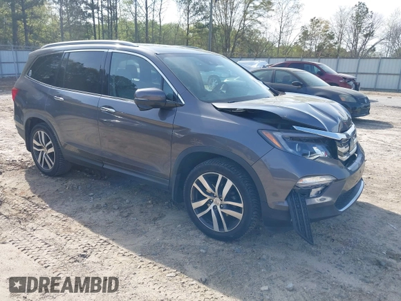 2017 Honda Pilot Touring with VIN 5FNYF5H9XHB046479, listed as a IAAI auction lot 41941449 with 162,554 mi miles. Bid and sale history available at carsss.com. Image 1.