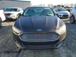 2015 Ford Fusion SE z VIN 3FA6P0H70FR123108, wystawiony jako Copart lot #50421725 z przebiegiem 165 521 mil mil oraz Szkoda całkowita • Salvage title. Historia ofert i sprzedaży dostępna na DreamBid. Obrazek 5.