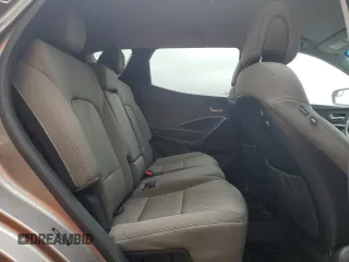 2017 Hyundai Santa Fe 2.4L z VIN 5NMZU3LB8HH032409, wystawiony jako Copart lot #57939915 z przebiegiem 105 494 mil mil oraz Szkoda całkowita • Salvage title. Historia ofert i sprzedaży dostępna na DreamBid. Obrazek 10.