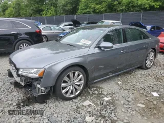 2016 Audi A8 L 4.0T Sport with VIN WAU43AFD0GN010739, listed as a Copart auction lot 63829554 with 201,213 mi miles and Salvage Title. Bid and sale history available at carsss.com. Image 1.