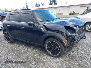 2015 MINI Countryman S z VIN WMWZC3C57FWT06297, wystawiony jako IAAI lot #41988157 z przebiegiem 74 461 mil mil oraz . Historia ofert i sprzedaży dostępna na DreamBid. Obrazek 1.