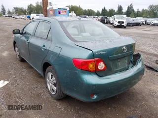 2010 Toyota Corolla with VIN 1NXBU4EE3AZ165944, listed as a IAAI auction lot 42597459 with 211,824 mi miles and . Bid and sale history available at DreamBid. Image 3.