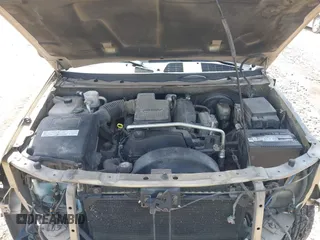 2005 GMC Envoy SLE with VIN 1GKDT13S252264932, listed as a IAAI auction lot 41981566 with 140,566 mi miles. Bid and sale history available at carsss.com. Image 10.