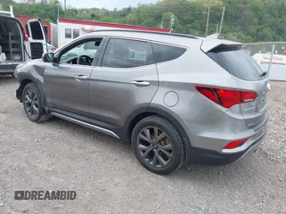 2017 Hyundai Santa Fe Ultimate z VIN 5XYZWDLA4HG441962, wystawiony jako IAAI lot #42144550 z przebiegiem 124 627 mil mil oraz . Historia ofert i sprzedaży dostępna na DreamBid. Obrazek 3.