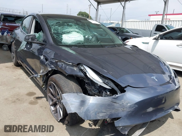2023 Tesla Model 3 with VIN 5YJ3E1EA0PF518904, listed as a IAAI auction lot 42058540 with 20,945 mi miles and . Bid and sale history available at DreamBid. Image 6.