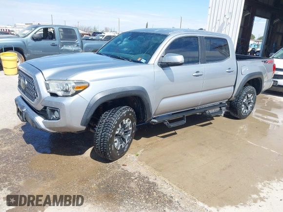2018 Toyota Tacoma SR with VIN 3TMCZ5AN3JM170037, listed as a IAAI auction lot 42565385 with 157,450 mi miles and . Bid and sale history available at DreamBid. Image 17.