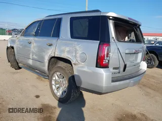 2020 GMC Yukon SLT Standard Edition with VIN 1GKS2DKCXLR294027, listed as a IAAI auction lot 41004965 with 69,161 mi miles. Bid and sale history available at carsss.com. Image 3.