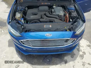 2017 Ford Fusion Hybrid SE z VIN 3FA6P0LU6HR319103, wystawiony jako Copart lot #58494695 z przebiegiem 104 483 mil mil oraz Szkoda całkowita • Salvage title. Historia ofert i sprzedaży dostępna na DreamBid. Obrazek 11.