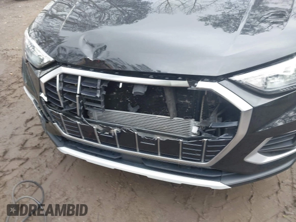 2021 Audi Q3 Premium with VIN WA1AUCF34M1148531, listed as a IAAI auction lot 41815286 with 31,934 mi miles and . Bid and sale history available at DreamBid. Image 6.