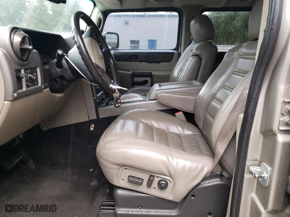 2003 Hummer H2 with VIN 5GRGN23U73H111109, listed as a Copart auction lot 76388144 with 160,179 mi miles and Salvage Title. Bid and sale history available at carsss.com. Image 7.
