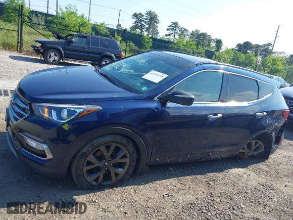2018 Hyundai Santa Fe Ultimate with VIN 5XYZWDLA3JG571432, listed as a IAAI auction lot 42395245 with 69,330 mi miles and . Bid and sale history available at DreamBid. Image 14.