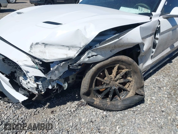 2018 Ford Mustang EcoBoost z VIN 1FA6P8TH9J5101182, wystawiony jako IAAI lot #41847168 z przebiegiem 98 168 mil mil oraz . Historia ofert i sprzedaży dostępna na DreamBid. Obrazek 6.