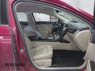 2014 Ford Fusion SE Hybrid with VIN 3FA6P0LU5ER136237, listed as a IAAI auction lot 41590088 with 174,009 mi miles. Bid and sale history available at carsss.com. Image 5.