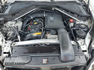 2012 BMW X5 35i с VIN 5UXZV4C58CL987049, выставлен на аукционе Copart как лот 61013925 с пробегом 167 508 миль миль и Чистый • Clean title. История ставок и продаж доступна на DreamBid. Изображение 12.