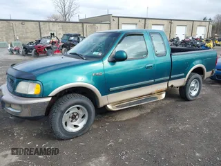 1997 Ford F-150 XL with VIN 1FTDX18WXVNB82554, listed as a IAAI auction lot 41821547 with 236,735 mi miles. Bid and sale history available at carsss.com. Image 2.