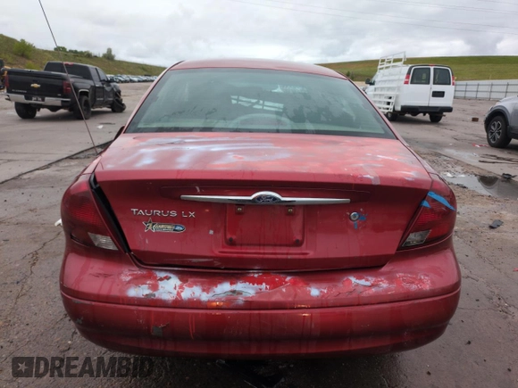 2001 Ford Taurus LX with VIN 1FAFP52UX1A176008, listed as a Copart auction lot 58983935 with 123,985 mi miles and Salvage title. Bid and sale history available at DreamBid. Image 6.
