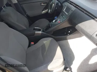 2015 Toyota Prius Four with VIN JTDKN3DU8F1984610, listed as a IAAI auction lot 42165175 with 128,803 mi miles and . Bid and sale history available at DreamBid. Image 5.