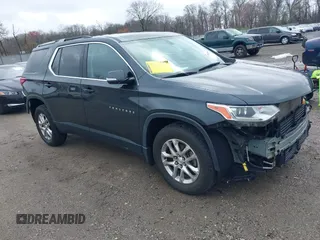 2018 Chevrolet Traverse LT Cloth z VIN 1GNEVGKW7JJ156198, wystawiony jako IAAI lot #41909259 z przebiegiem 82 719 mil mil oraz . Historia ofert i sprzedaży dostępna na DreamBid. Obrazek 1.